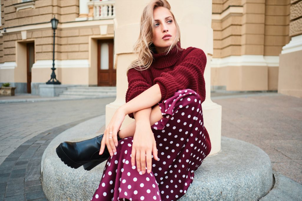 woman wearing a trendy cashmere sweater