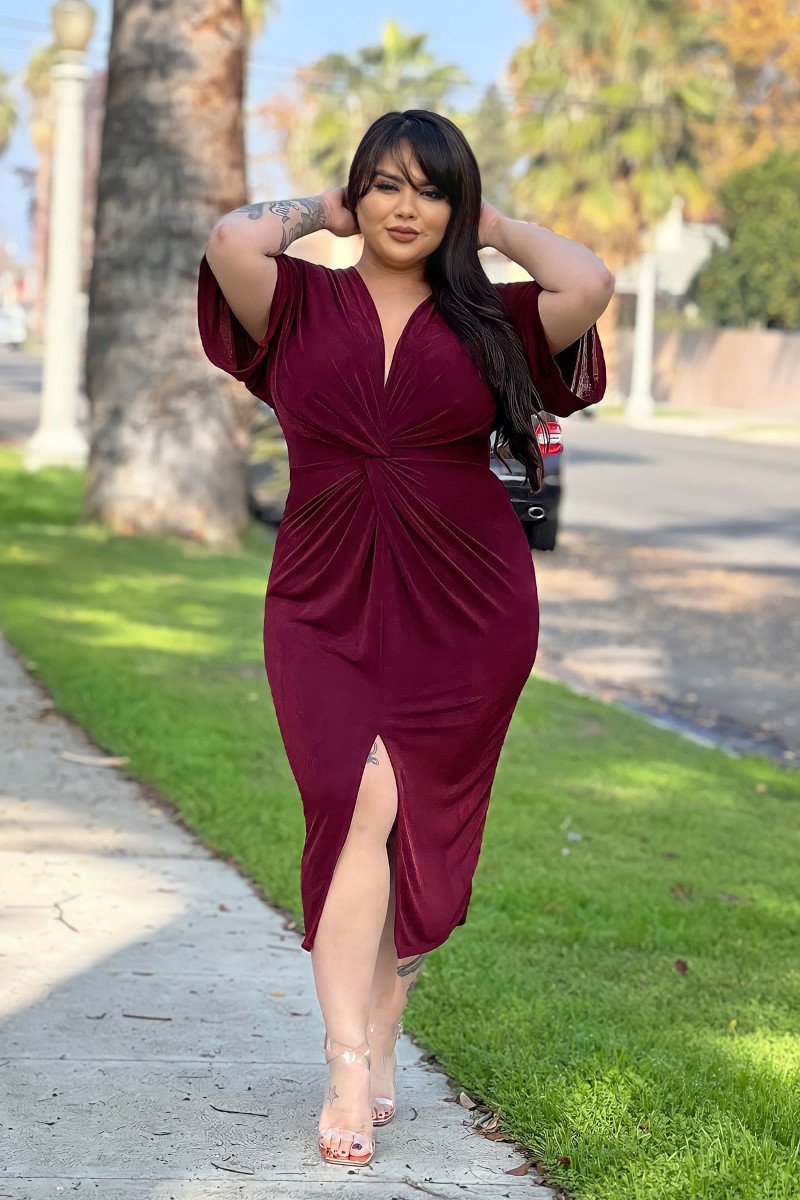 Velvet dress worn by a curvy woman