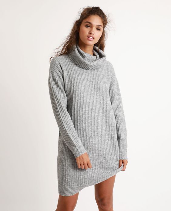 woman in a cashmere sweater dress