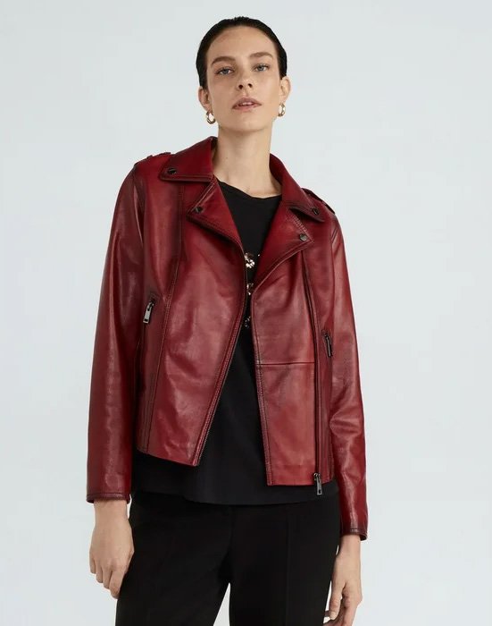 Woman wearing a red leather biker jacket