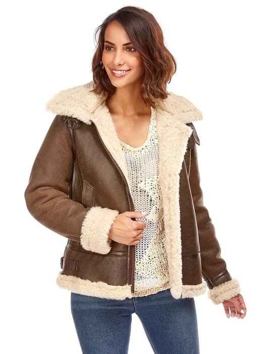 Woman wearing a camel igloo bomber