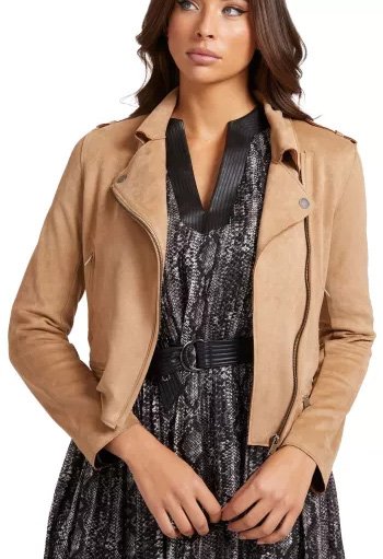 Brown leather perfecto worn by a brunette woman