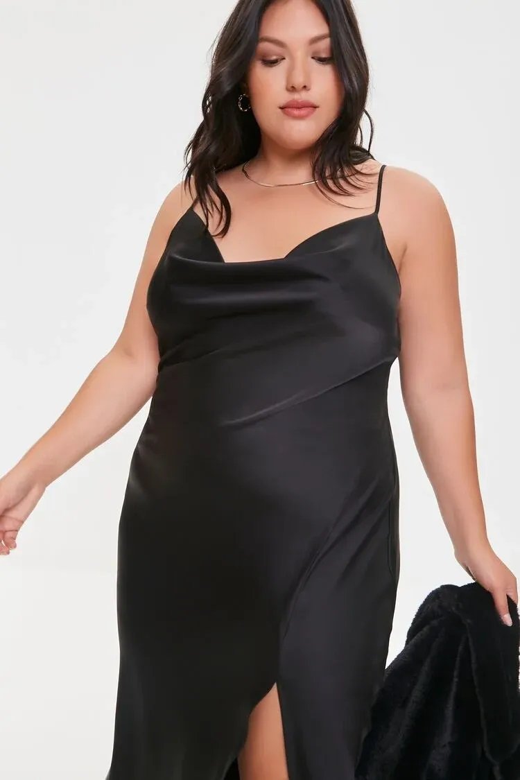 Black satin dress worn by a curvy woman