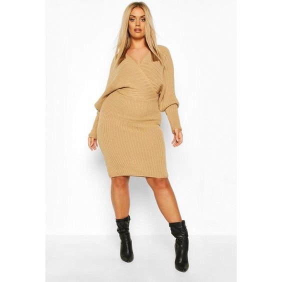 Knit dress ideal for winter worn by a curvy woman