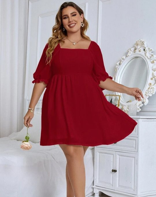 Curvy woman wearing a short flared red dress