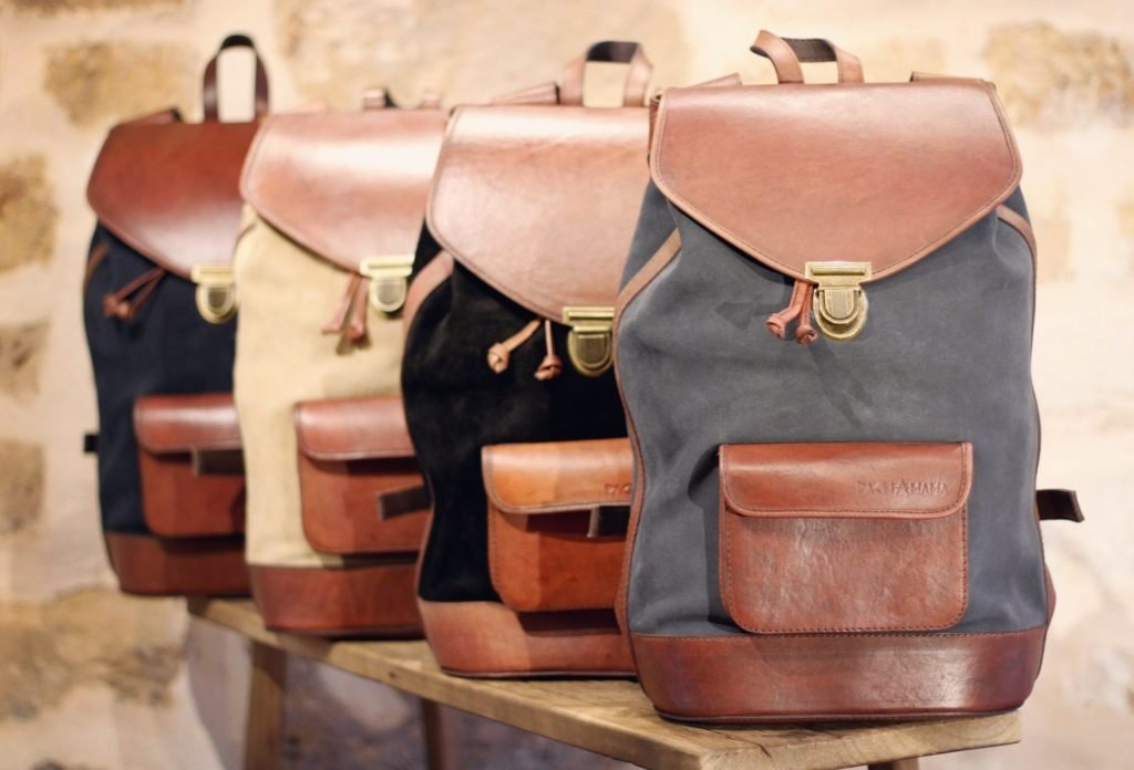 Various vintage pachamama backpacks for men in leather