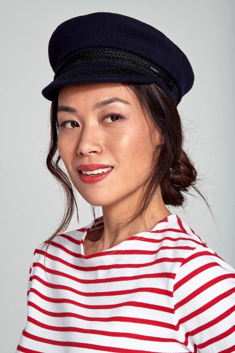 Woman wearing a belon sailor cap from Armor Lux Fr