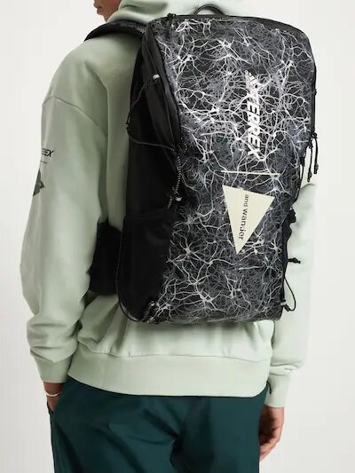 Man wearing an and wander hiking backpack from Adidas