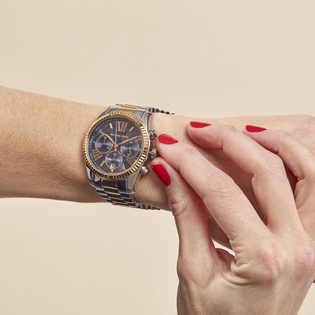 Woman wearing the blue Lexington watch from Michael Kors