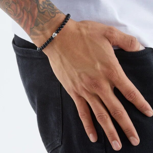 Man wearing a black beaded bracelet from Thomas Sabo