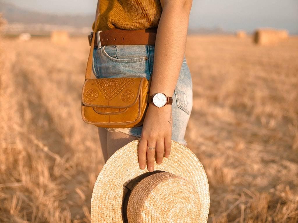 Woman wearing a watch on her left hand