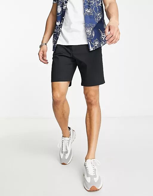 A man wearing casual-chic shorts