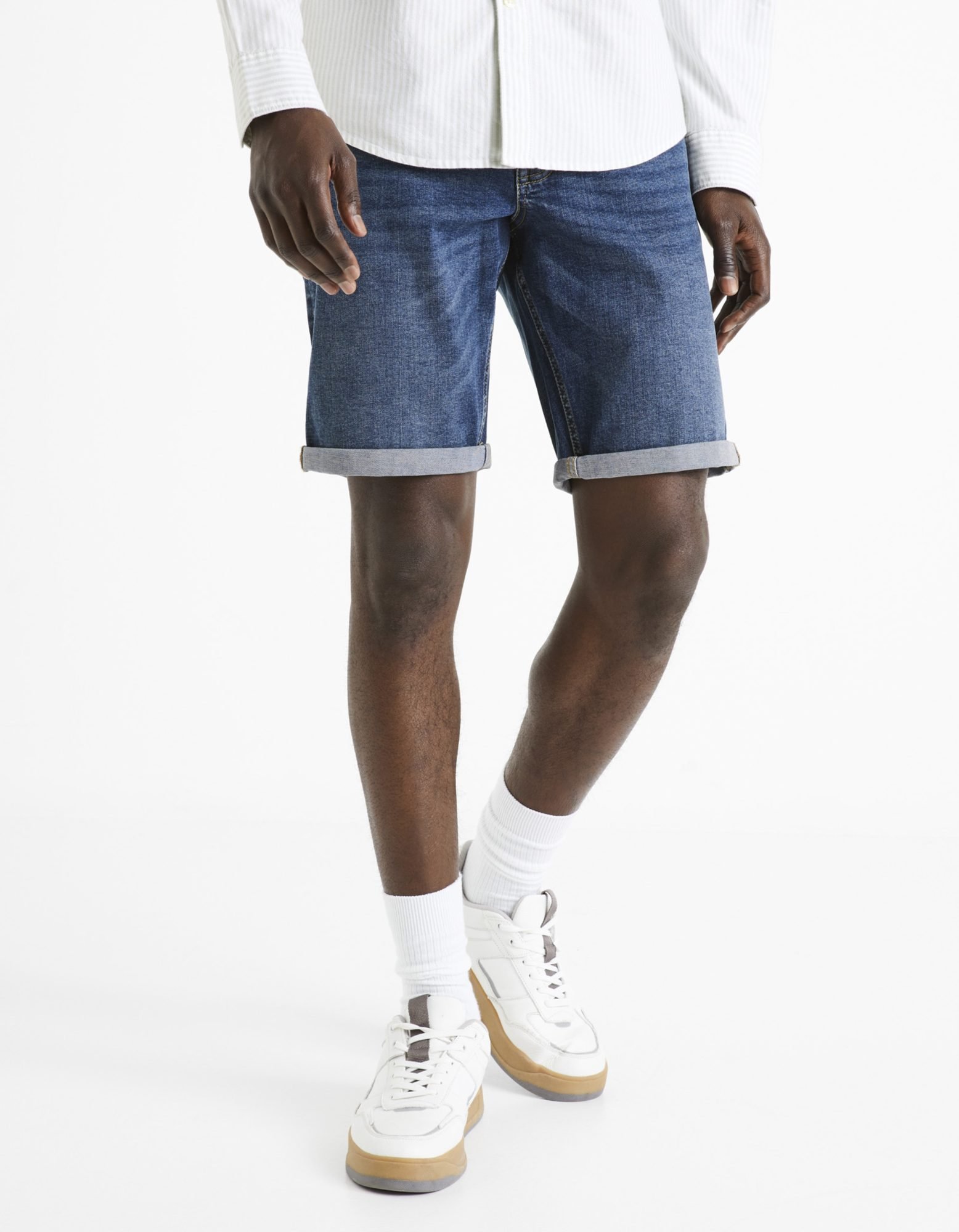 Rolled up denim shorts by Celio