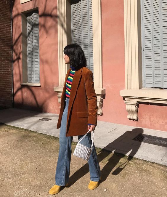 Suede jacket worn in a seventies style