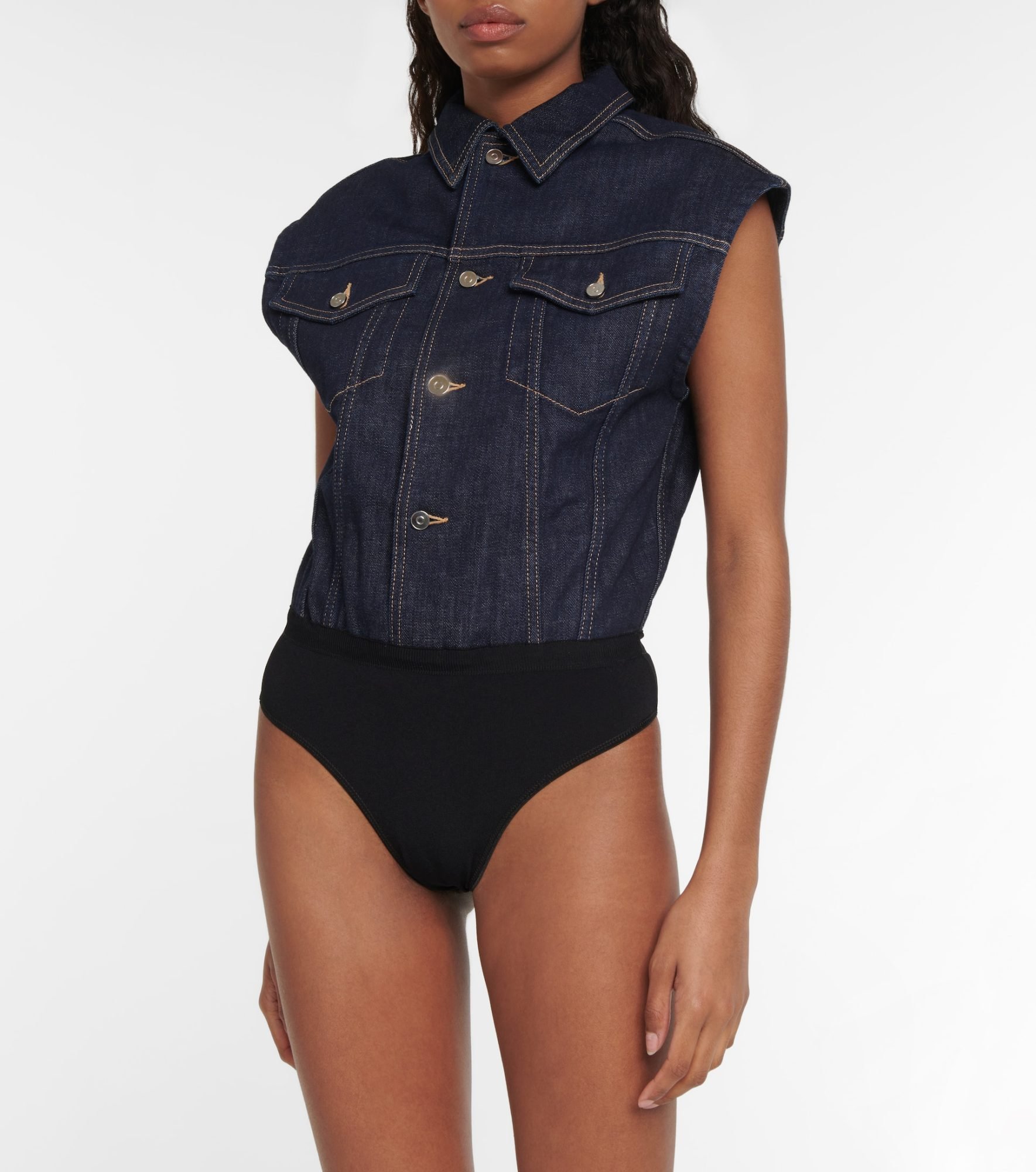 Trendy denim bodysuit by the brand Alaïa: closeup