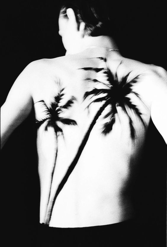 Black palm painting on model runway Raf Simon