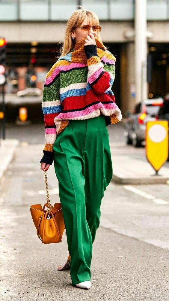 Elegant style with a knitted sweater worn by a woman.