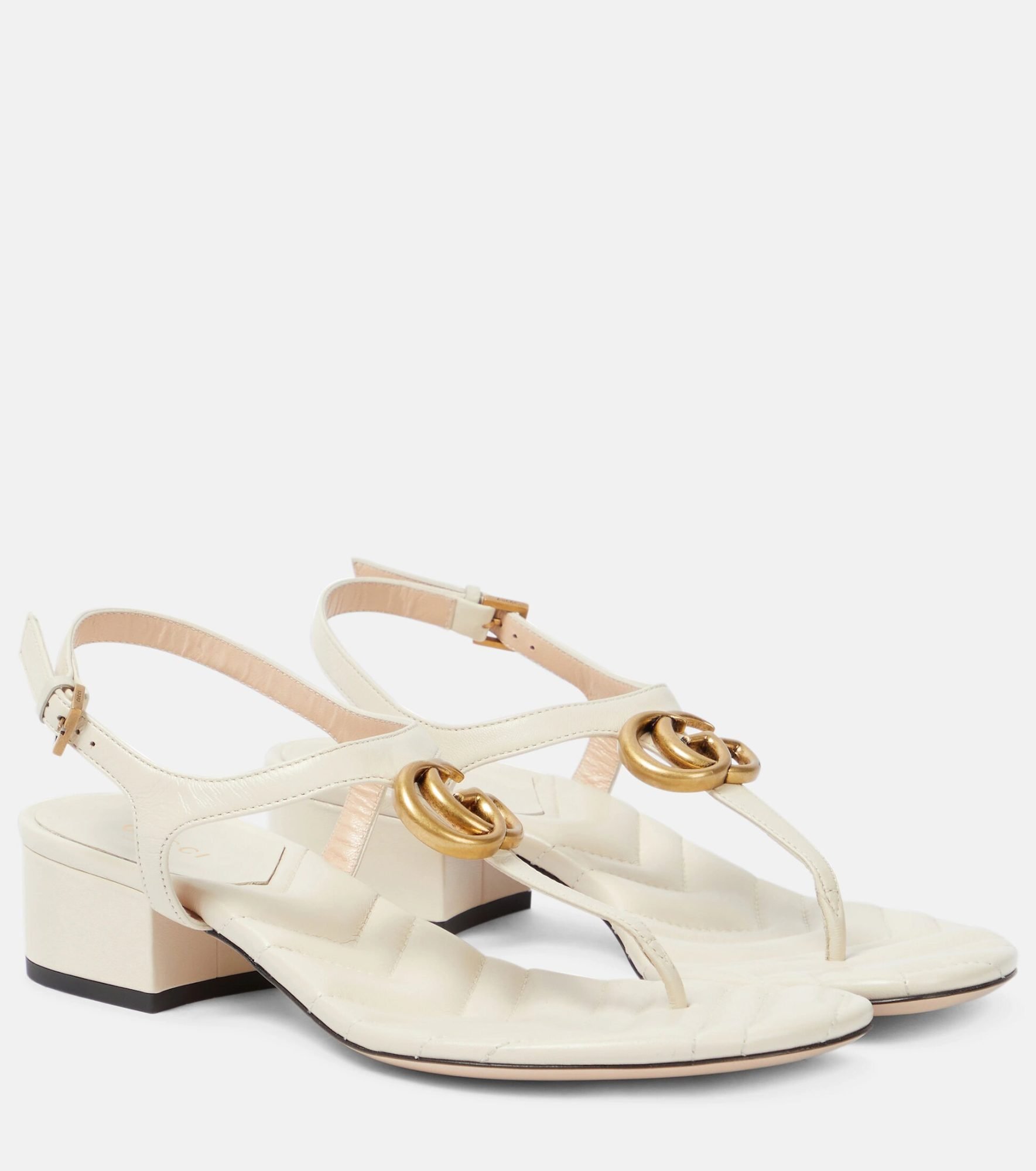 White double G leather sandals by Gucci