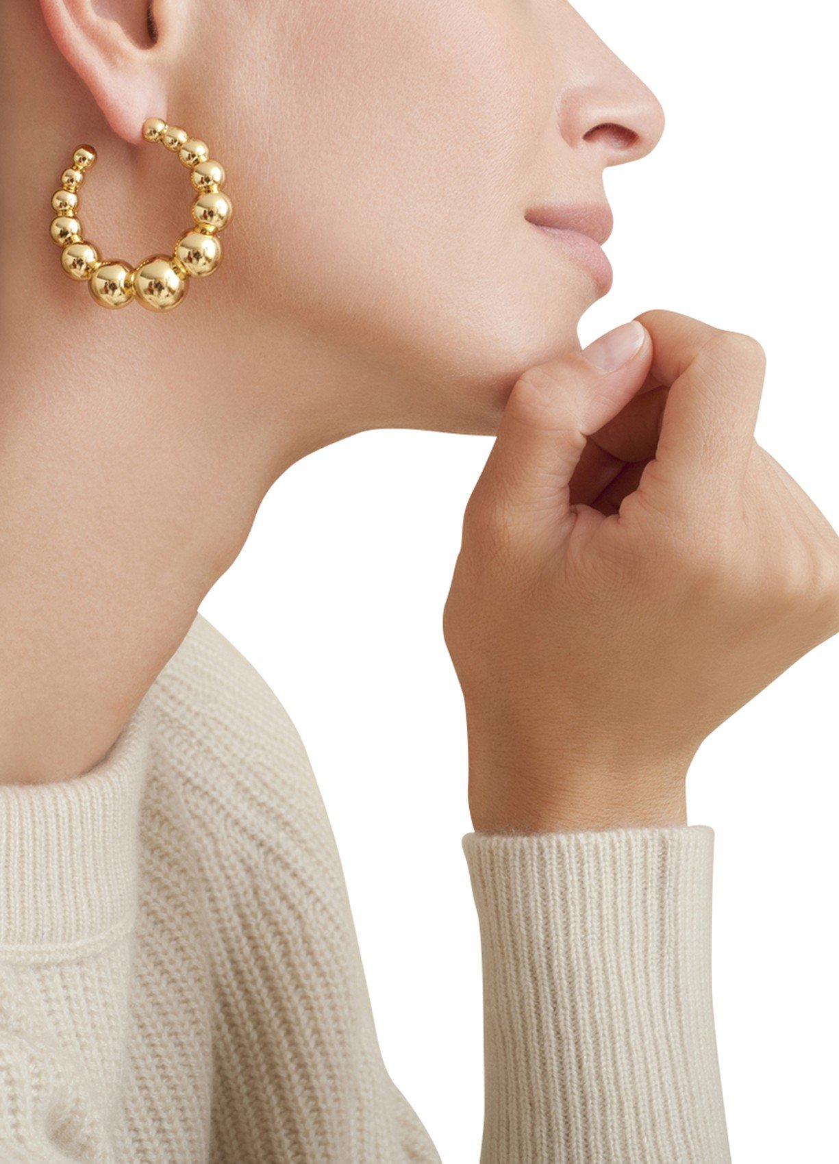 Wide pearl hoop earrings from the brand Andy