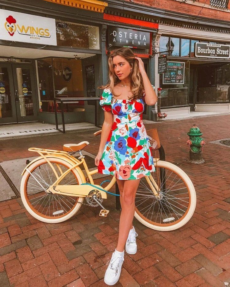 wearing sneakers with a dress