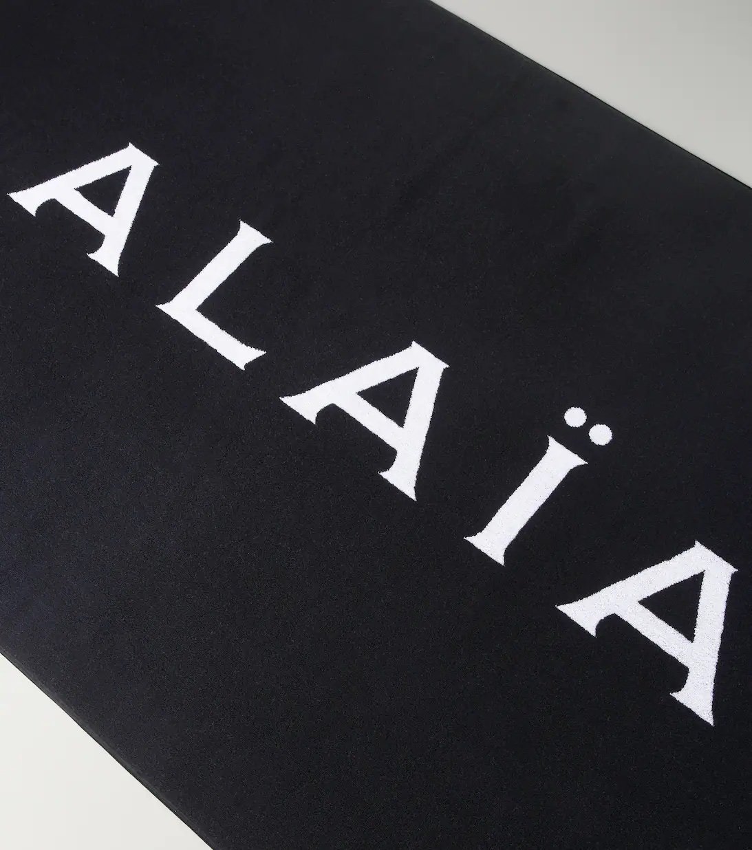 Alaïa jacquard cotton towel with logo