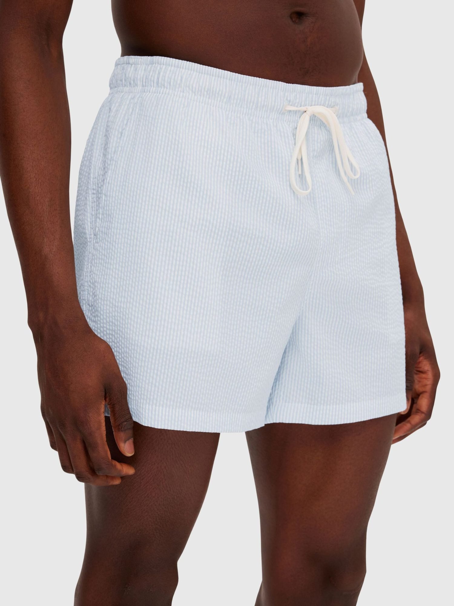 Short swim trunks with white and blue stripes made of recycled polyester Selected