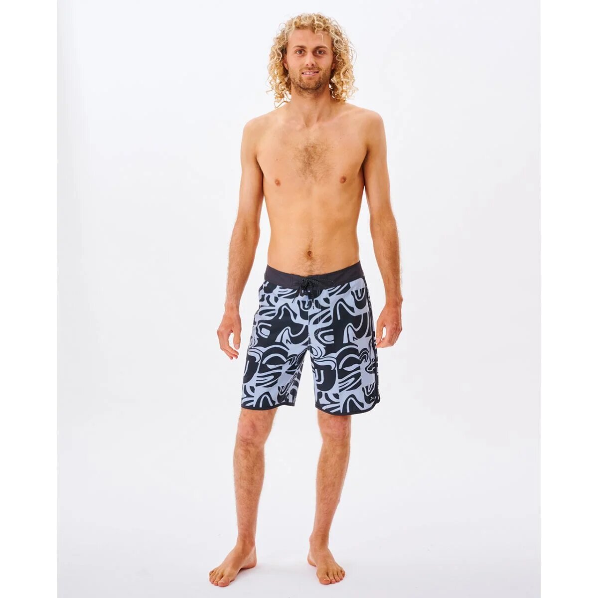 Black and white patterned Rip Curl swim trunks