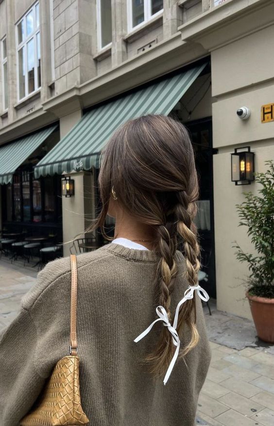 Hairstyle idea with ribbons in braids