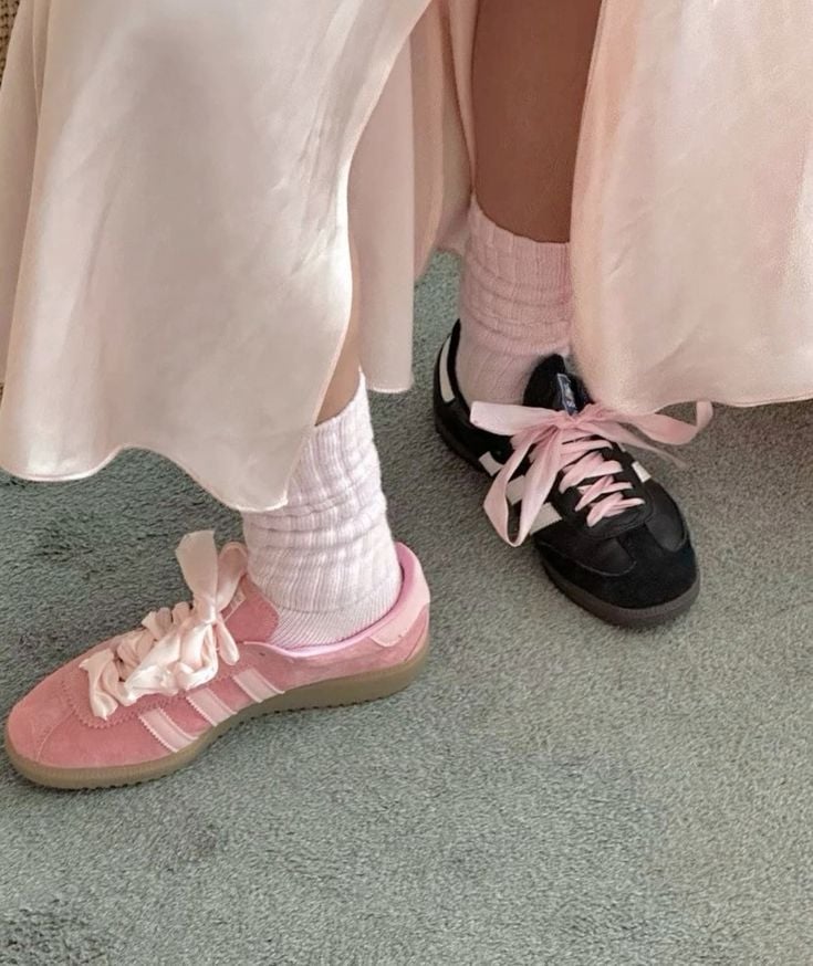 Pair of sneakers with bows and ribbons