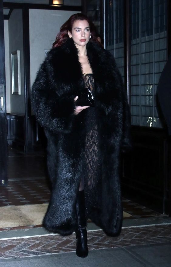 Why is everyone talking about the Mob Wife aesthetic in 2024? 4 Black fur coat Dua Lipa