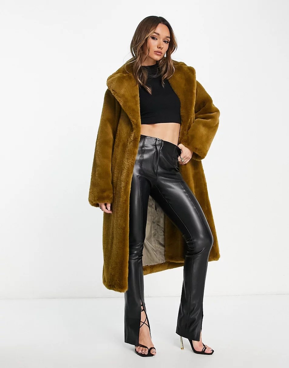 Why is everyone talking about the Mob Wife aesthetic in 2024? 30 Brown faux fur coat Mango