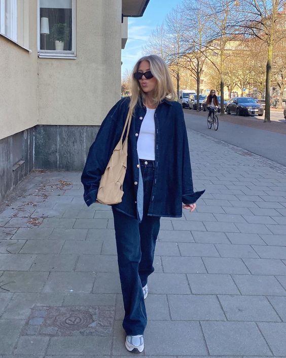 Total denim look for women in dark blue