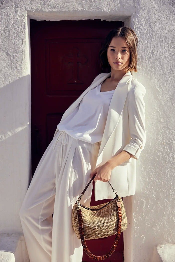 Raffia: The Golden Thread of Modern Craftsmanship 4 Sacs chapeaux et pochettes en raphia les accessoires phares de la saison 1 Raphia le fil dor de lartisanat moderne Modalova