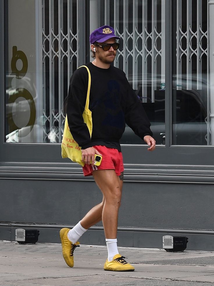 Soft and Colorful Sneakers Seen by Prada and Jacquemus 2 Harry Styles wearing Prada Collapse Re-Nylon soft sneakers trend Modalova