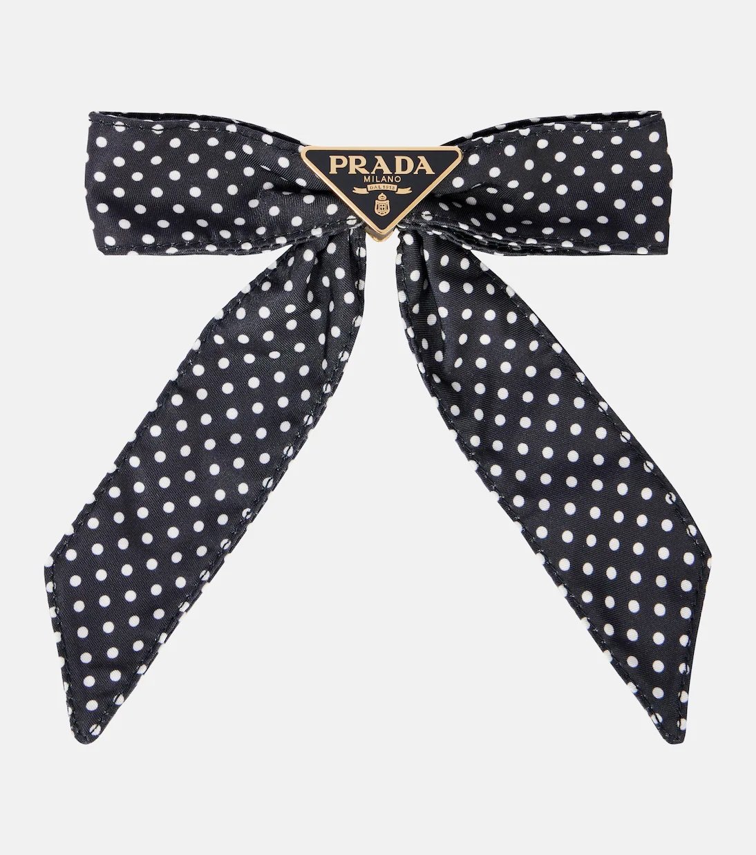 The polka dot print is back like never before! 44 Prada polka dot bow hairpin