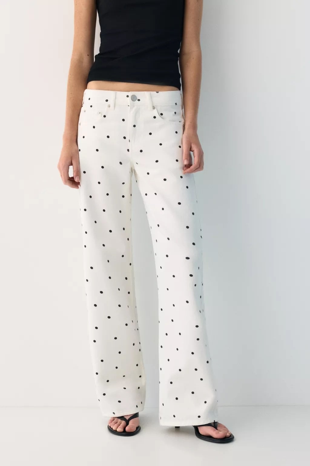 The polka dot print is back like never before! 27 White pants with black polka dots by Pull & Bear