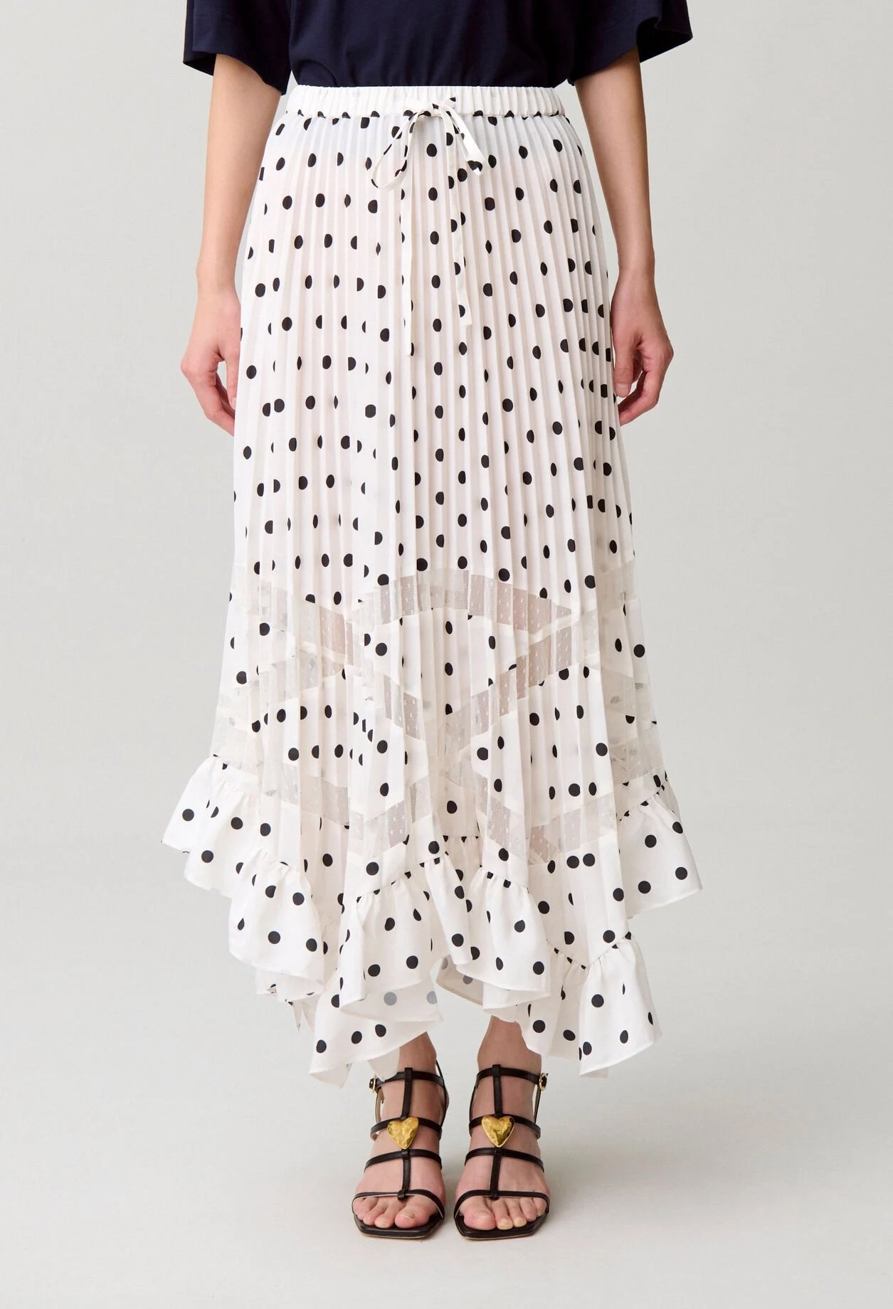 The polka dot print is back like never before! 21 Long white skirt with polka dots by Claudie Pierlot