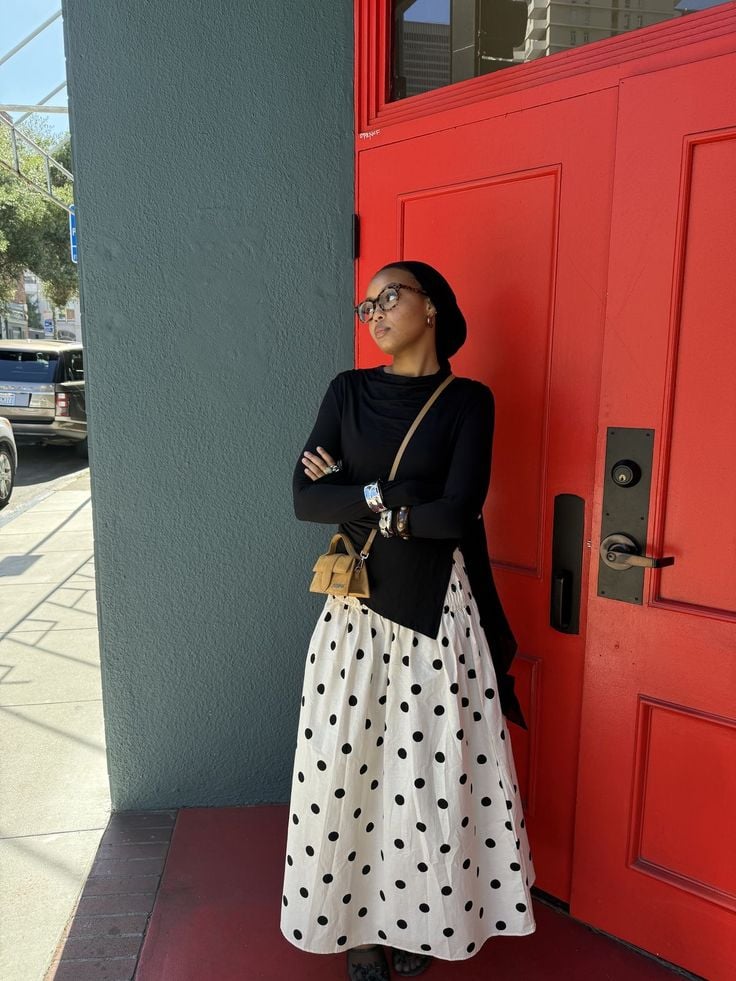The polka dot print is back like never before! 18 Long white skirt with black dots